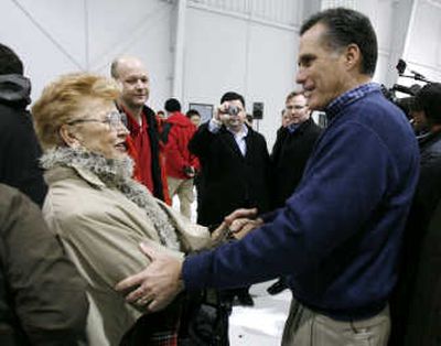 
Mitt Romney greets well-wishers after a rally Wednesday in Cedar Rapids, Iowa. Associated Press
 (Associated Press / The Spokesman-Review)