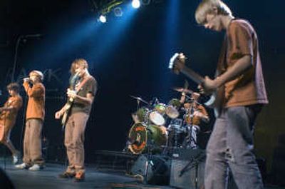 
Guilty Conscience performs at the RAWK Fall Showcase Saturday. The band has been playing together for years, and the 13- and 14-year-old members had to raise money to buy their own equipment.   
 (Photos by CHRISTOPHER ANDERSON / The Spokesman-Review)