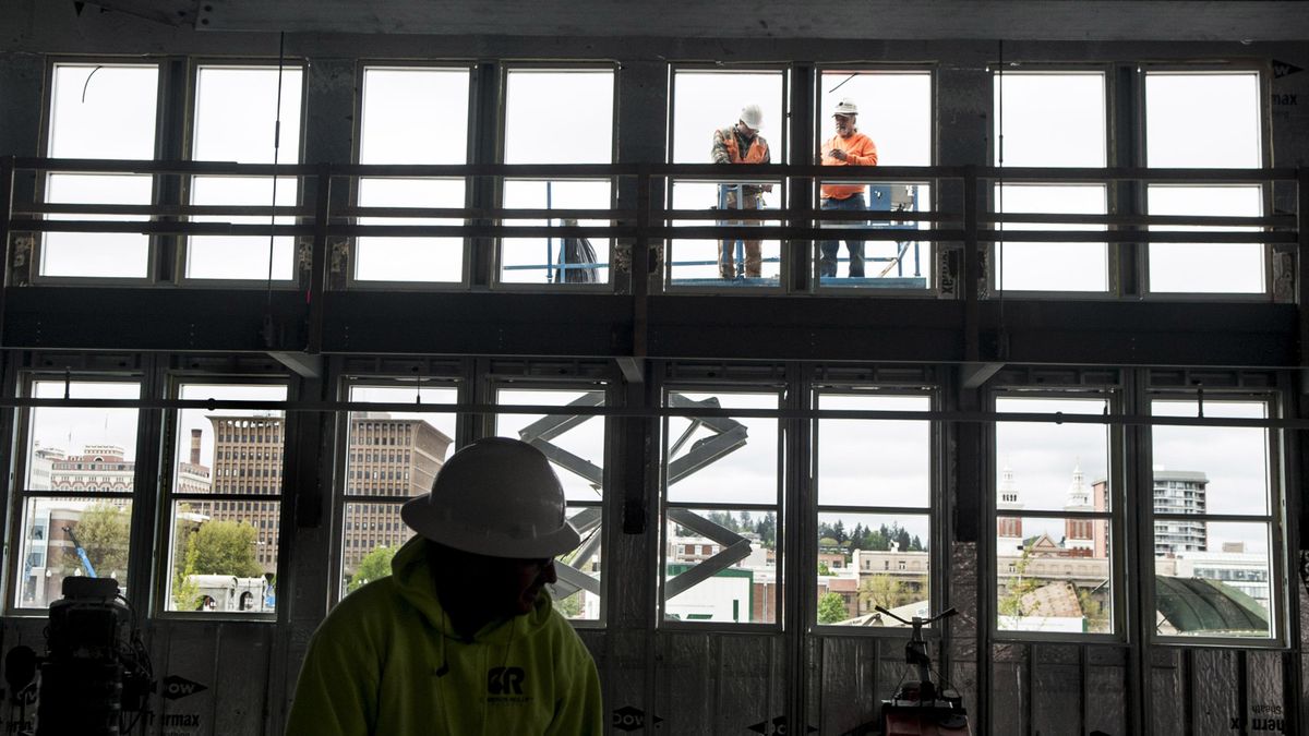 Construction continues on a 28,000-square-foot grocery store in Kendall Yards. My Fresh Basket Marketplace aims to open in mid-June. Kathy Plonka/THE SPOKESMAN-REVIEW (Kathy Plonka / The Spokesman-Review)