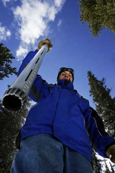 
Hydrologist Joe Messina measures snow levels in Grant, Colo., on  March 31. The Colorado mountains are expected to unleash runoff not seen in 11 years. Streams in the Northwest are forecast to carry up to 50 percent more water than usual. Associated Press photos
 (Associated Press photos / The Spokesman-Review)