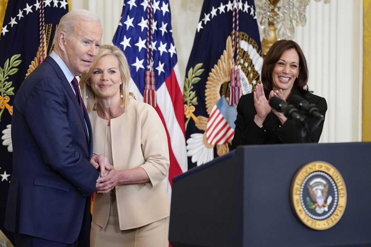 President Joe Biden talks with Gretchen Carlson as Vice President Kamala Harris applauds before Biden signs a bill to end forced arbitration in sexual harassment cases in the workplace, Thursday, March 3, 2022, in the East Room of the White House in Washington. (Patrick Semansky)