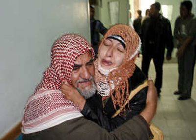 
Associated Press  Relatives react after  seeing the bodies of six Hamas militants in the morgue of Nasser hospital in Khan Younis, southern Gaza Strip, on Tuesday.
 (Associated Press / The Spokesman-Review)
