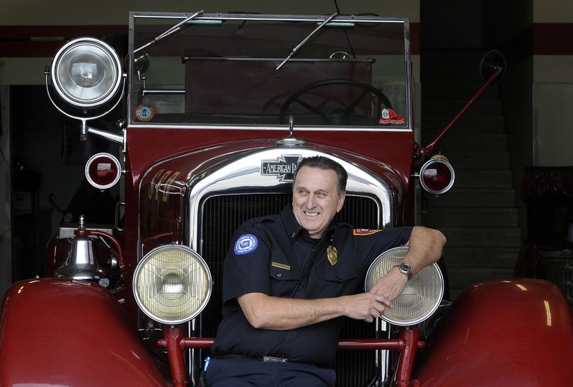 Spokane Fire Department Lt. Jack Greenamyer sits atop a 1936 pumper housed at Station No. 3. Greenamyer joined the department on Feb. 15, 1965. (Dan Pelle)