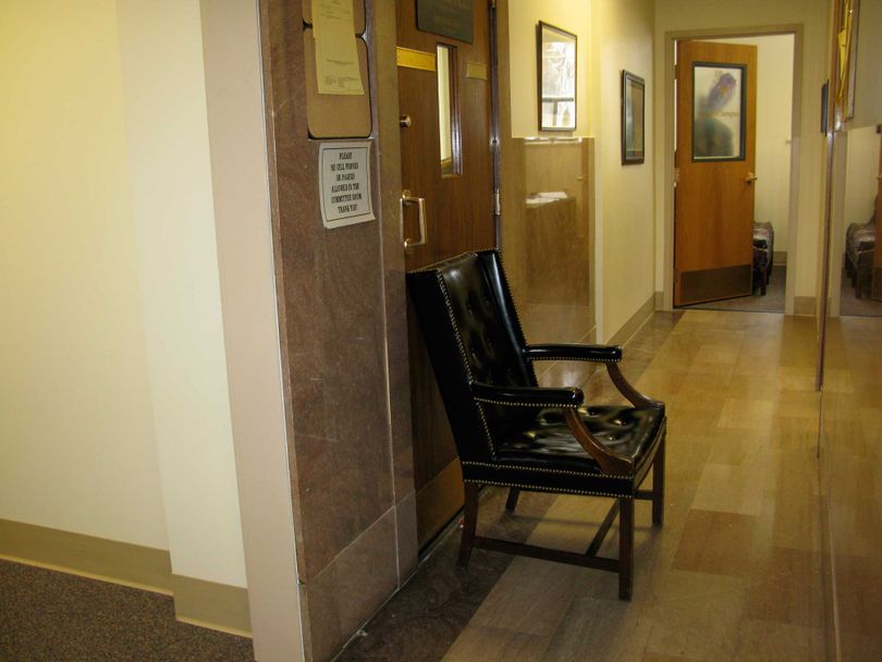 A large chair was pushed against the door as Senate Republicans met in a closed caucus for more than two hours the afternoon of Monday, April 13, 2009. (Betsy Russell / The Spokesman-Review)