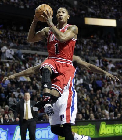 Derrick Rose had 36 points, 10 assists for red-hot Bulls. (Associated Press)
