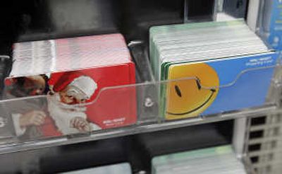 
Wal-Mart gift cards are seen on display at a Wal-Mart in Mountain View, Calif., last week. Associated Press
 (Associated Press / The Spokesman-Review)