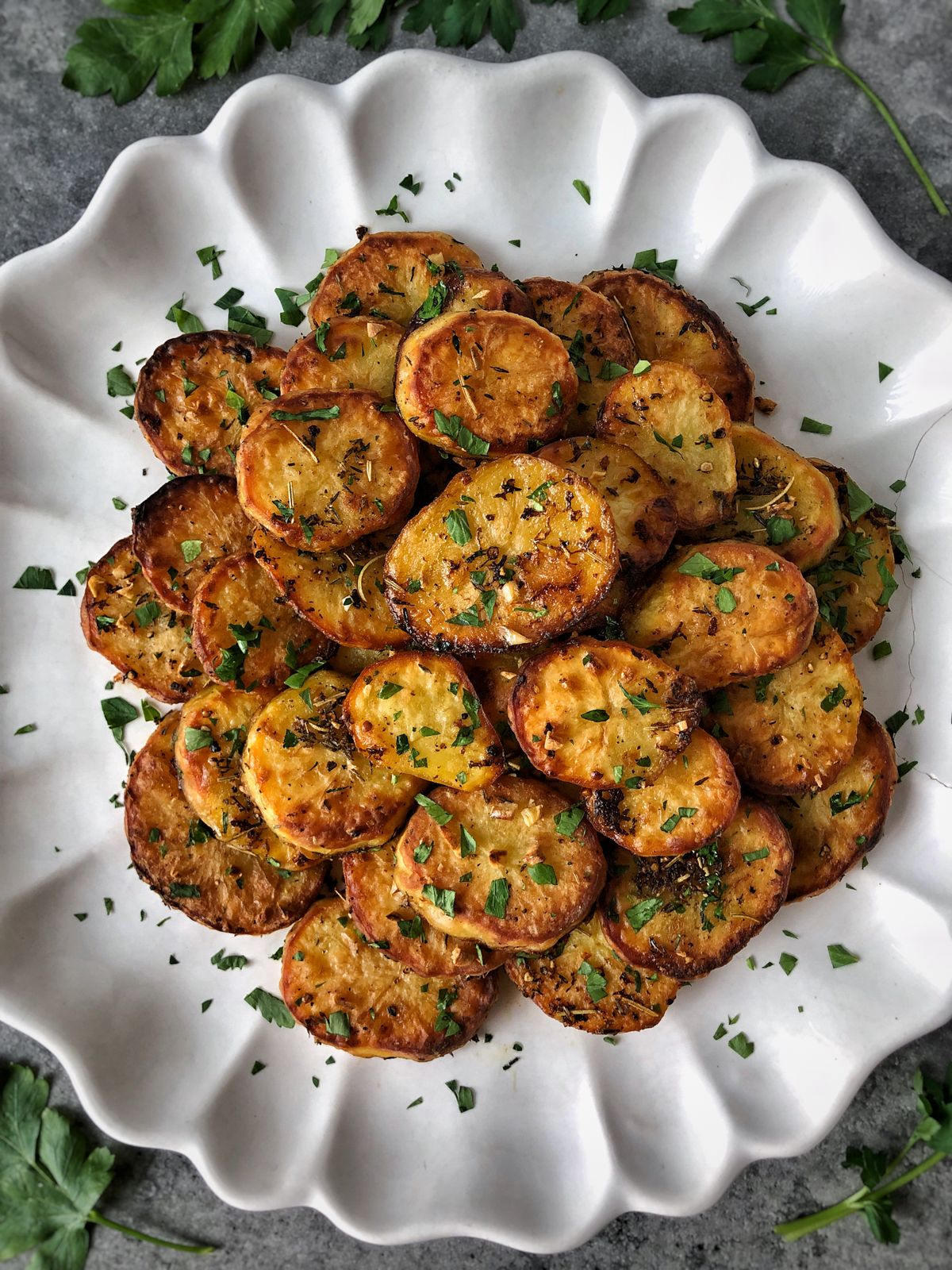 Melting potatoes are golden and crisp on the outside and lusciously creamy on the inside. (Audrey Alfaro/For The Spokesman-Review)