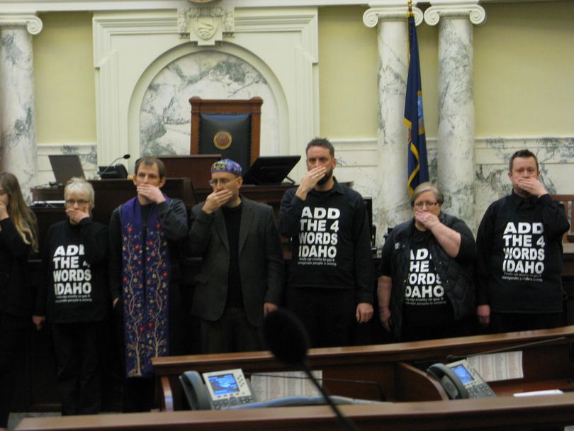 'Add the 4 Words' protesters, including members of Idaho clergy, stand in silent protest in the Idaho House chamber on Monday morning, refusing to leave (Betsy Russell)