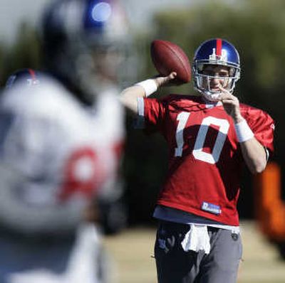 
Eli Manning's mistake-free postseason has led the New York Giants to within one win of a title. Associated Press
 (Associated Press / The Spokesman-Review)
