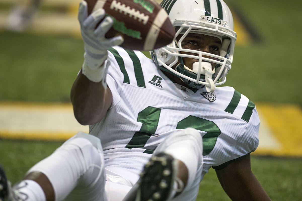 Bobcats WR Jordan Reid shows the ball he caught for a 15-yard touchdown to put Ohio ahead 14-0 in the first quarter in Moscow. (Colin Mulvany)