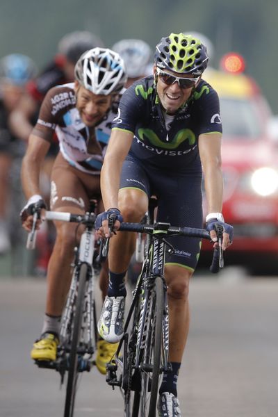 Alejandro Valverde, front, Jean-Christophe Peraud are among the contenders for second. (Associated Press)