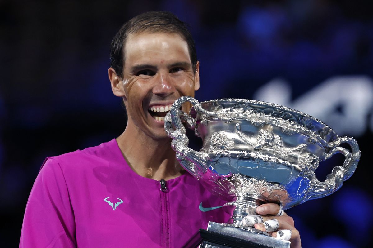 Rafael Nadal of Spain holds the Norman Brookes Challenge Cup after defeating Daniil Medvedev of Russia in the men