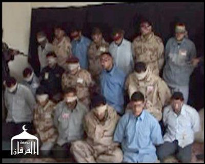 
This picture posted on a Web site on Friday claims these blindfolded men were the policemen found killed northeast of Baghdad, Iraq, but some Iraqi officials doubt a connection. 
 (Associated Press / The Spokesman-Review)