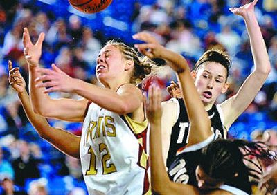
Lewis and Clark's Katelan Redmon, right, and Kiki January, bottom, force a turnover on University's Angie Bjorklund in the 4A girls final. 
 (Holly Pickett / The Spokesman-Review)