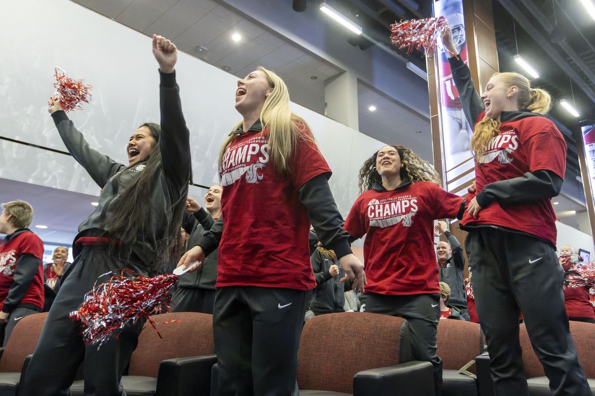 Members of the Washington Sate University women’s basketball team celebrate during an NCAA Tournament selection watch party on Sunday at Gesa Field in Pullman. The team will play Florida Gulf Coast in the first round on Saturday.  (Geoff Crimmins/For The Spokesman-Review)