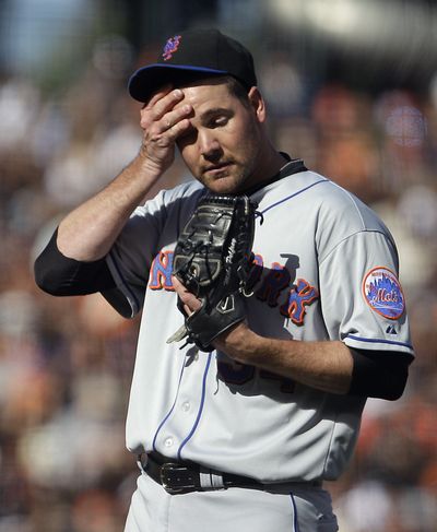 Mike Pelfrey has been sweating his way through this season with a 4.67 ERA as the N.Y. Mets’ No. 1 pitcher. (Associated Press)