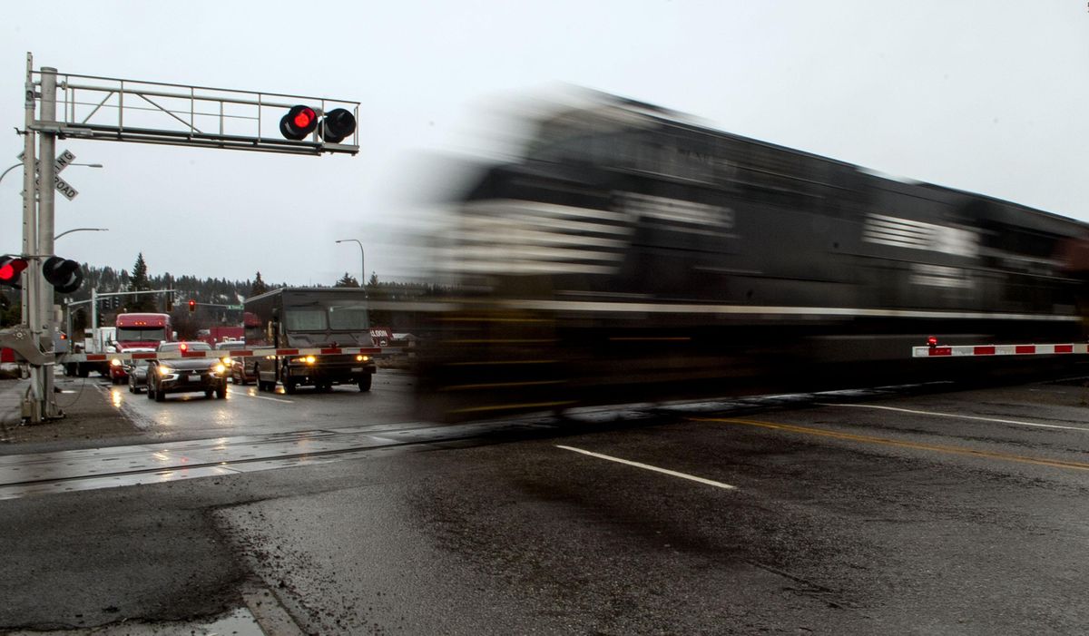 The railroad crossing at Pines Road photographed  Thursday Spokane Valley is moving forward with plans for another at-grade intersection improvement project at the crossing. (Kathy Plonka / The Spokesman-Review)