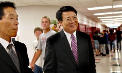 
South Korean school officials Zang Su Ok, left, and Sin Kyu Lee toured Canfield Middle School on Tuesday in preparation for their student-exchange program. 
 (Kathy Plonka / The Spokesman-Review)