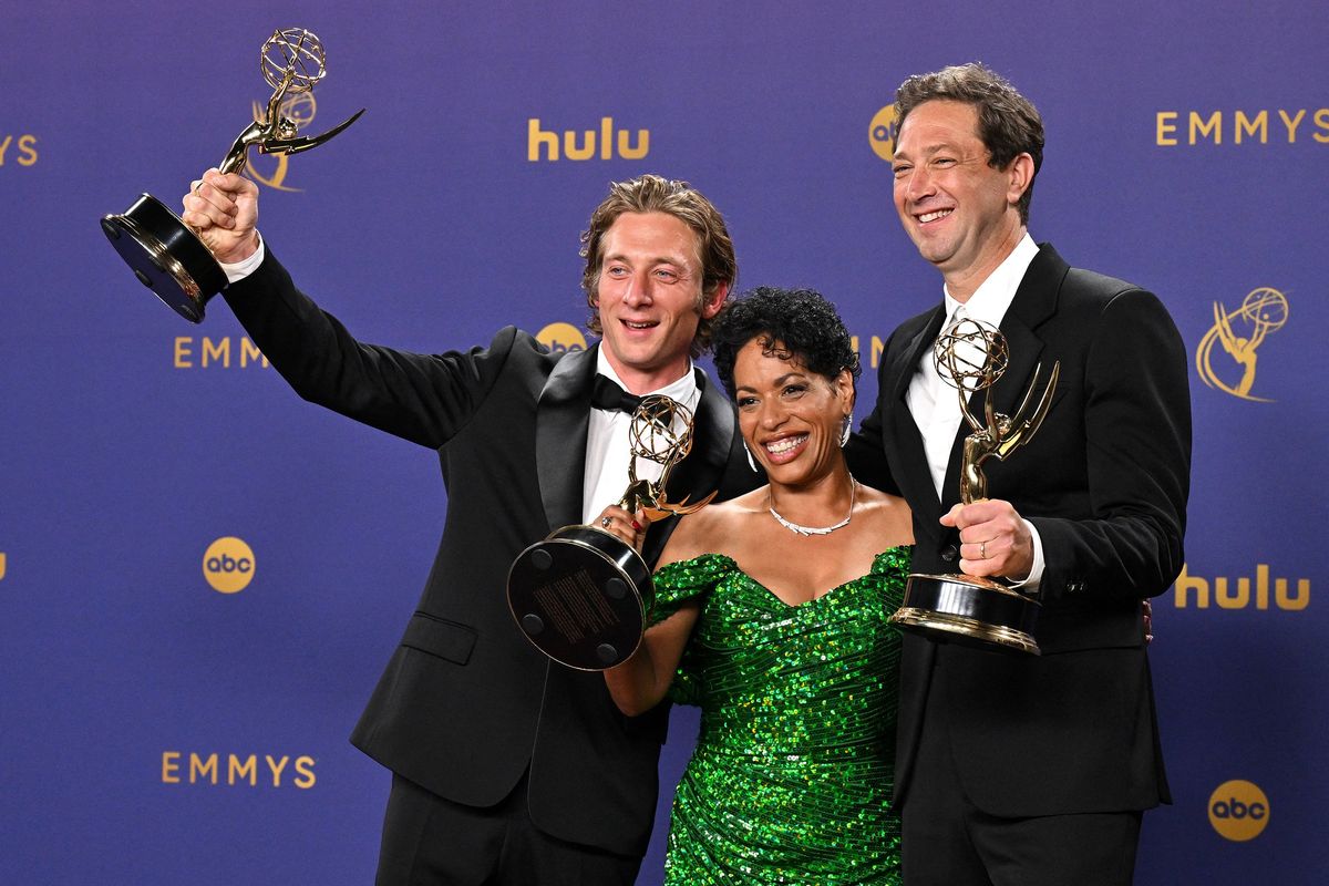 Jeremy Allen White, left, Liza Colón-Zayas and Ebon Moss-Bachrach pose in the press room Sunday with their awards for their roles in “The Bear” during the 76th Primetime Emmy Awards at the Peacock Theater in Los Angeles.  (Getty Images)