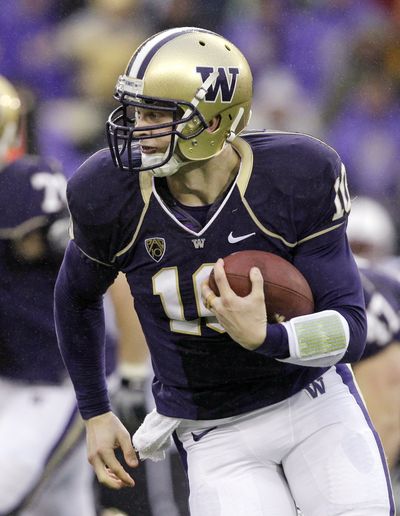 UW fans are well acquainted with Jake Locker’s athletic abilities.  (Associated Press)