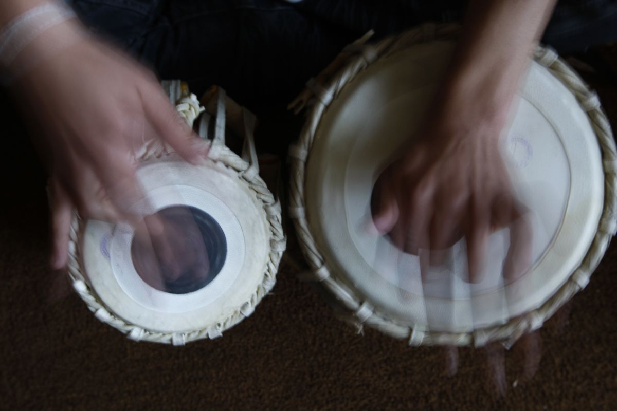 FILE - In this May 11, 2010 file photo, a student learns to play the tabla at the Afghan National Institute of Music, ANIM, in Kabul, Afghanistan. A few years after the Taliban were ousted in 2001, and with Afghanistan still in ruins, Ahmad Sarmast left his home in Melborne, Australia where he had sought asylum in the 90s, on a mission: to revive music in the country of his birth. The music school Sarmast founded was a unique experiment in inclusivity for the war-ravaged nation — with orphans and street kids in the student body.  (Saurabh Das)