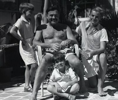 Ernest Hemingway with his three sons Jack, Patrick and Gregory.  (Courtesy)