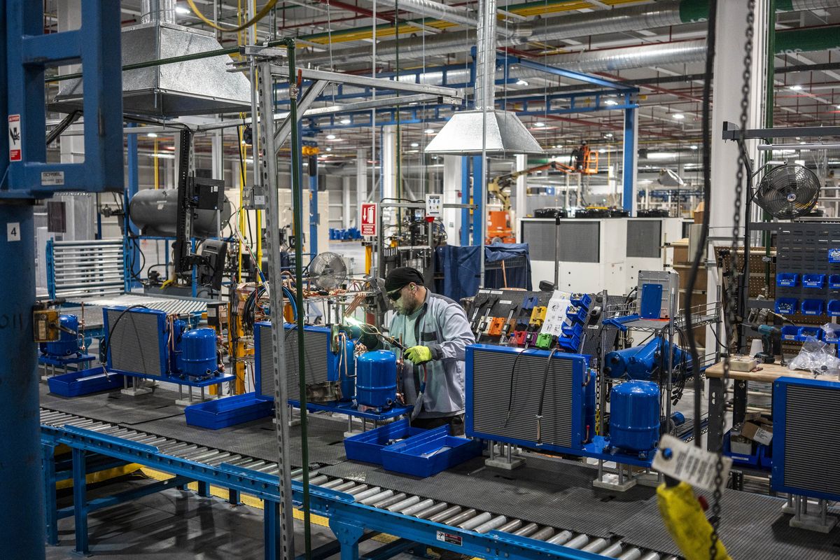 A worker at a factory assembling refrigeration and air-conditioning units, of which about 80% are sent the U.S., for the Danish company Danfoss on May 21 in Apodaca, in northern Mexico. In a letter to Mexico’s president sent on Saturday, President Donald Trump claimed that Mexico was not doing enough to curb the flow of fentanyl into the United States and threatened to impose a 30% tariff on Mexican imports.  (New York Times file photo)