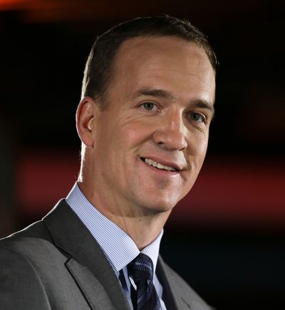 Denver Broncos quarterback Peyton Manning talks with reporters during a news conference on Sunday  in Jersey City, N.J.  (Mark Humphrey / Associated Press)