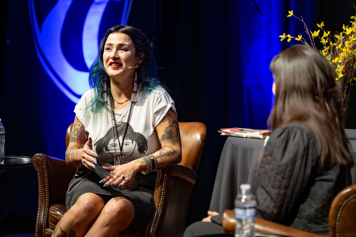 Sasha LaPointe, author of “Red Paint,” on left, has a conversation with Emma Noyes, Spokane artist and actor of Baby Speaks Salish, during a Northwest Passages event held Tuesday at the Montvale Event Center.  (COLIN MULVANY/THE SPOKESMAN-REVI)