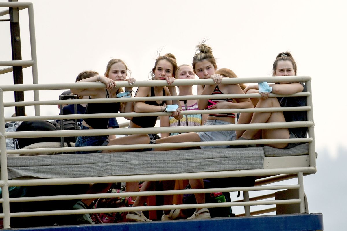 Campers from Camp Sweyolakan arrive Tuesday at Independence Point in Coeur d’Alene after their stay was cut short due to poor air quality.  (Kathy Plonka/The Spokesman-Review)