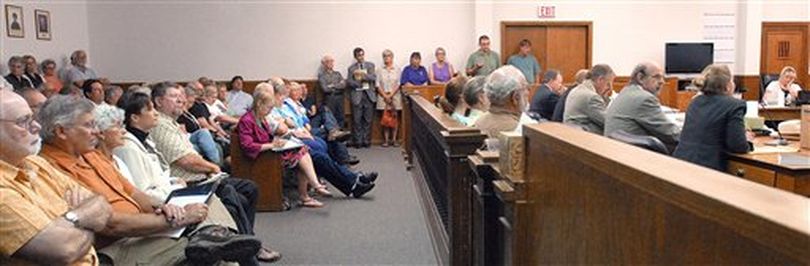 The Idaho 2nd District courtroom at Lewiston, Idaho, was full Monday, Aug. 23, 2010, as Judge John Bradbury heard arguments on both sides of permitting large truckloads of oil refining equipment to traverse scenic, winding U.S. Highway 12 from Lewiston across Lolo Pass to Montana. Bradbury says he will take a day before deciding whether ConocoPhillips can begin hauling massive loads of oil equipment along U.S. Highway 12 in northern Idaho. (AP Photo/Lewiston Tribune / Barry Kough)