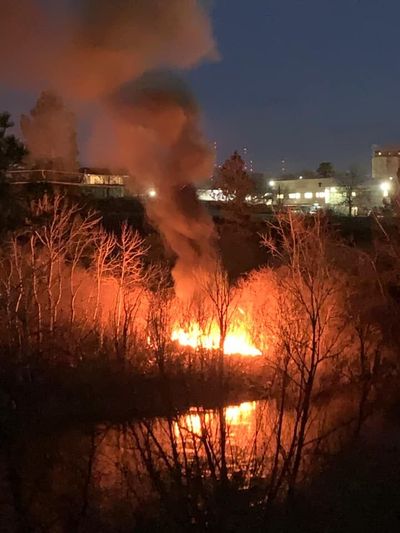 This fire at a homeless encampment grew to about 20 square feet after a campfire exploded Tuesday evening, Deputy Fire Chief Jay Atwood said.   (Courtesy Lydia Olmstead)