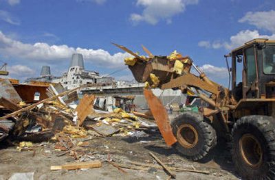 
Contracts for debris removal comprise most of the value of contracts awarded in the wake of Hurricane Katrina. 
 (Associated Press / The Spokesman-Review)