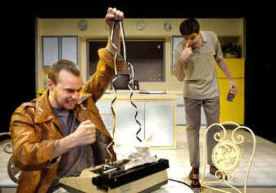 
Sean Cook, playing the part of Lee, gets mad while Nathan Smith as Austin gets drunk in the kitchen during a scene in Sam Shepard's 