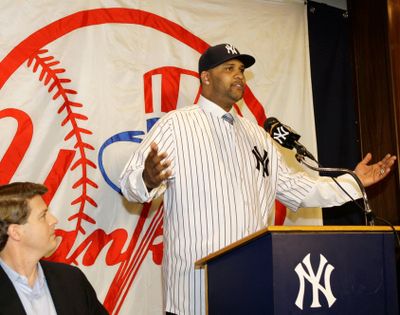 CC Sabathia’s contract with the Yankees includes a monster bonus. (Associated Press / The Spokesman-Review)