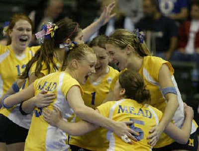 
Mead volleyball players celebrate their state title win over Eisenhower.  
 (Jim Bryant/Special to / The Spokesman-Review)