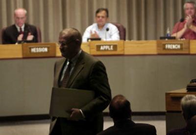 
Mayor Jim West leaves the podium after delivering the statement of the condition and affairs of the city.  
 (Holly Pickett / The Spokesman-Review)
