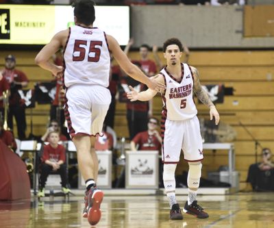 Eastern Washington guard Austin McBroom congratulates forward Venky Jois after a score against Northern Colorado on Feb. 13 at Reese Court in Cheney. On Monday, McBroom and Jois were named to the All-Big Sky Conference first team. (Tyler Tjomsland / The Spokesman-Review)