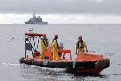 A boat searches for debris in the Atlantic Ocean on Saturday near the crash site of Air France Flight 447.  (Associated Press / The Spokesman-Review)