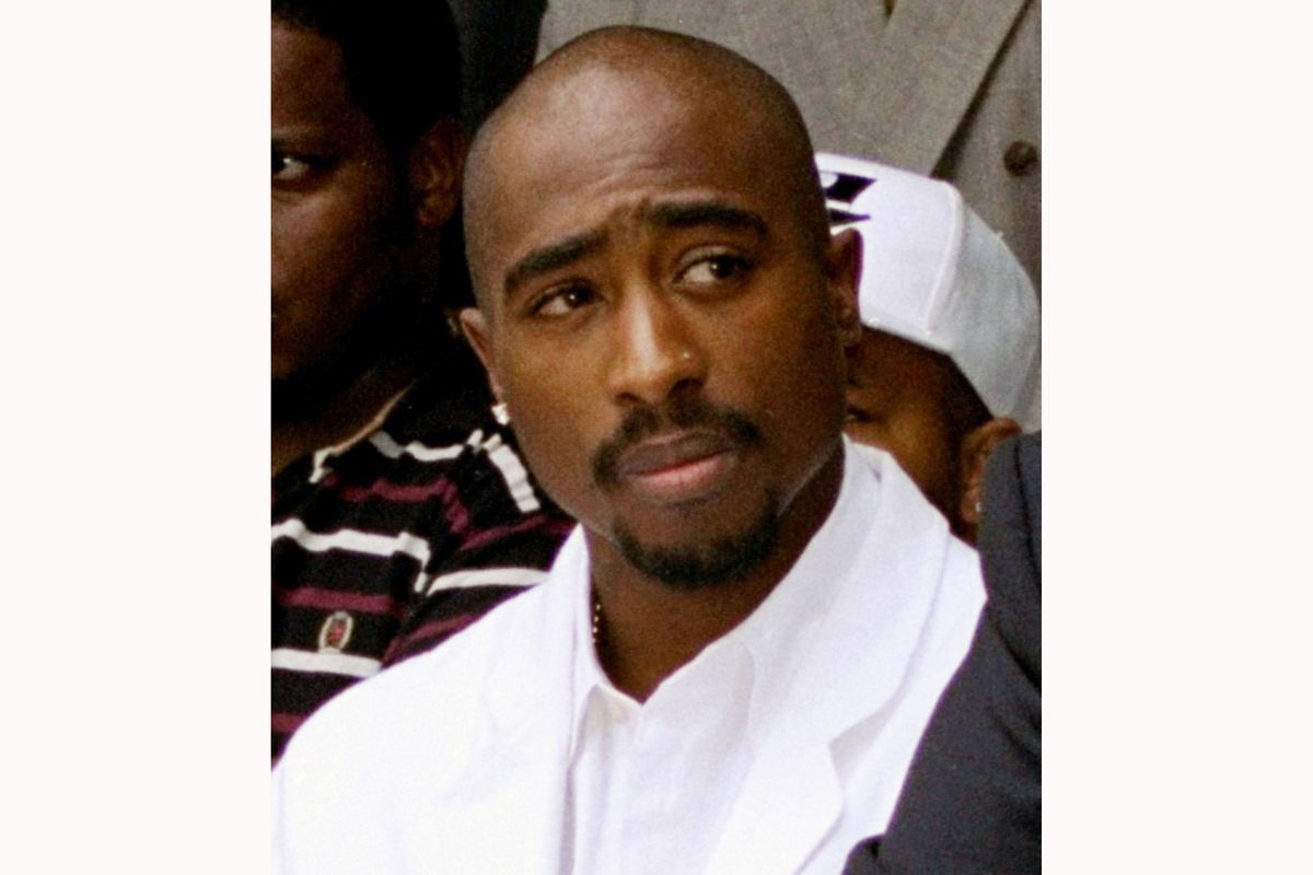 FILE - Rapper Tupac Shakur attends a voter registration event in South Central Los Angeles on Aug. 15, 1996. Shakur