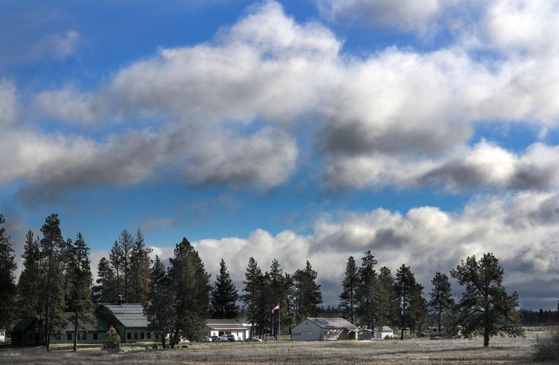 Blue skies and large clouds frame the headquarters complex on a sunny, windy at Turnbull Wildlife Refuge on Tuesday, March 30, 2010. (Christopher Anderson / The Spokesman-Review)