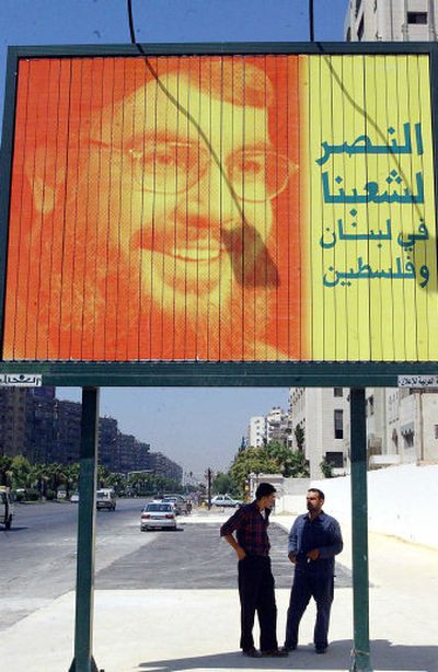 
A billboard  in Damascus  Monday  features a photo of  Hezbollah leader Sheikh Hassan Nasrallah and reads: 