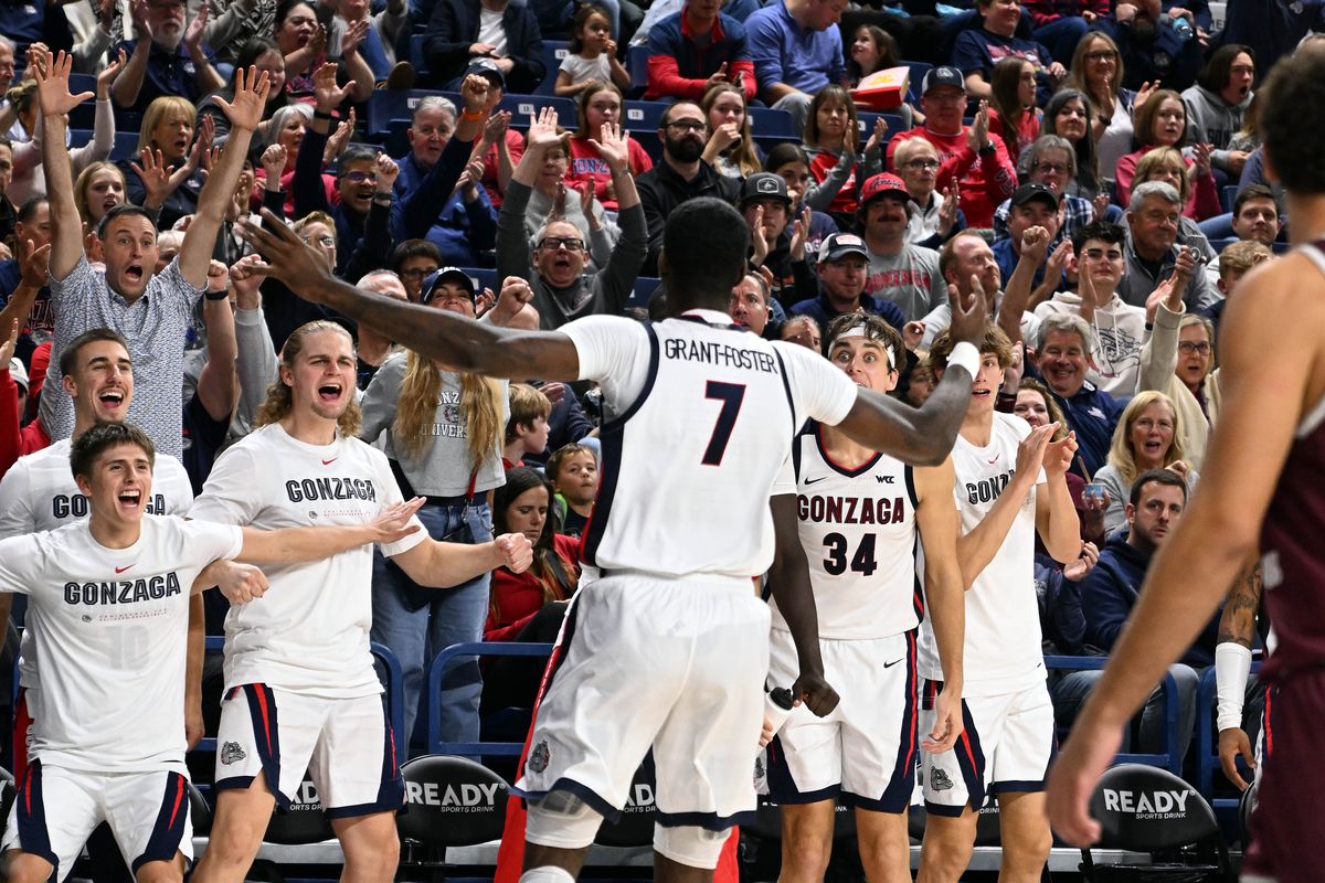 Gonzaga guard Tyon Grant-Foster (7) receives cheers from the bench after dunking the ball during the second half of a NCAA college basketball game, Monday, Nov. 3, 2025, in the McCarthey Athletic Center.  (COLIN MULVANY/THE SPOKESMAN-REVIEW)