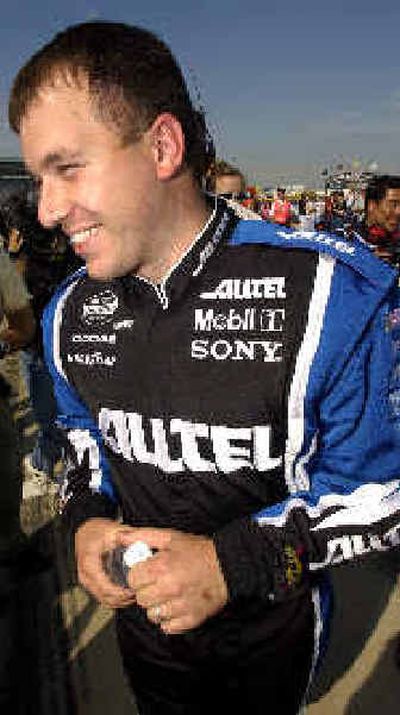 
Ryan Newman smiles after securing the Samsung/Radio Shack 500 pole. 
 (Associated Press / The Spokesman-Review)