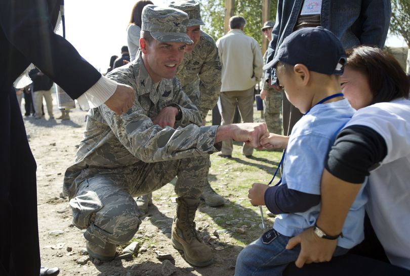 Col Dwight Sones, commander of the 376th Air Expeditionary Wing in Kyrgyzstan, has made community outreach a key focus of the U.S. air base. The base hosted an estimated 2,000 Kyrgyz visitors Oct. 18, 2010 for tours and demonstrations celebrating the more than 600 civilians from the Bishkek area who work at the Manas Transit Center. (Colin Mulvany / The Spokesman-Review)