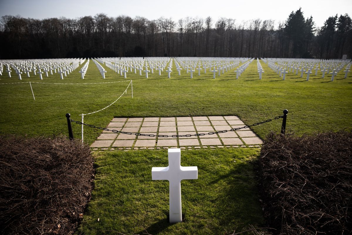 The grave of the Gen. George S. Patton at the Luxembourg American Cemetery, in Luxembourg City on Feb. 9, 2023. Tiny Luxembourg is trying to use its considerable wealth to buy weapons for Ukraine on the open market. "We were occupied many times in the last century, so we have an enormous sensibility for what it means for what is now happening in Ukraine," said Francois Bausch, Luxembourg's defense minister.    (Jim Huylebroek/The New York Times)