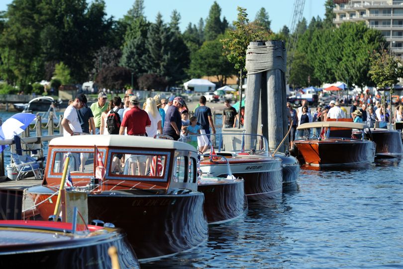 Crowds fill the boardwalk at the Coeur d’Alene Resort on Saturday during the annual Coeur d’Alene Wooden Boat Show. Lovingly preserved and restored classics gleamed in the sun as vintage hydroplanes roared past on the lake. (Jesse Tinsley)
