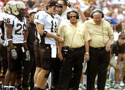 
It was a perplexing day in Martin Stadium for Idaho's Dennis Erickson, center, as he suffered his worst defeat as a head coach Saturday. 
 (Christopher Anderson / The Spokesman-Review)