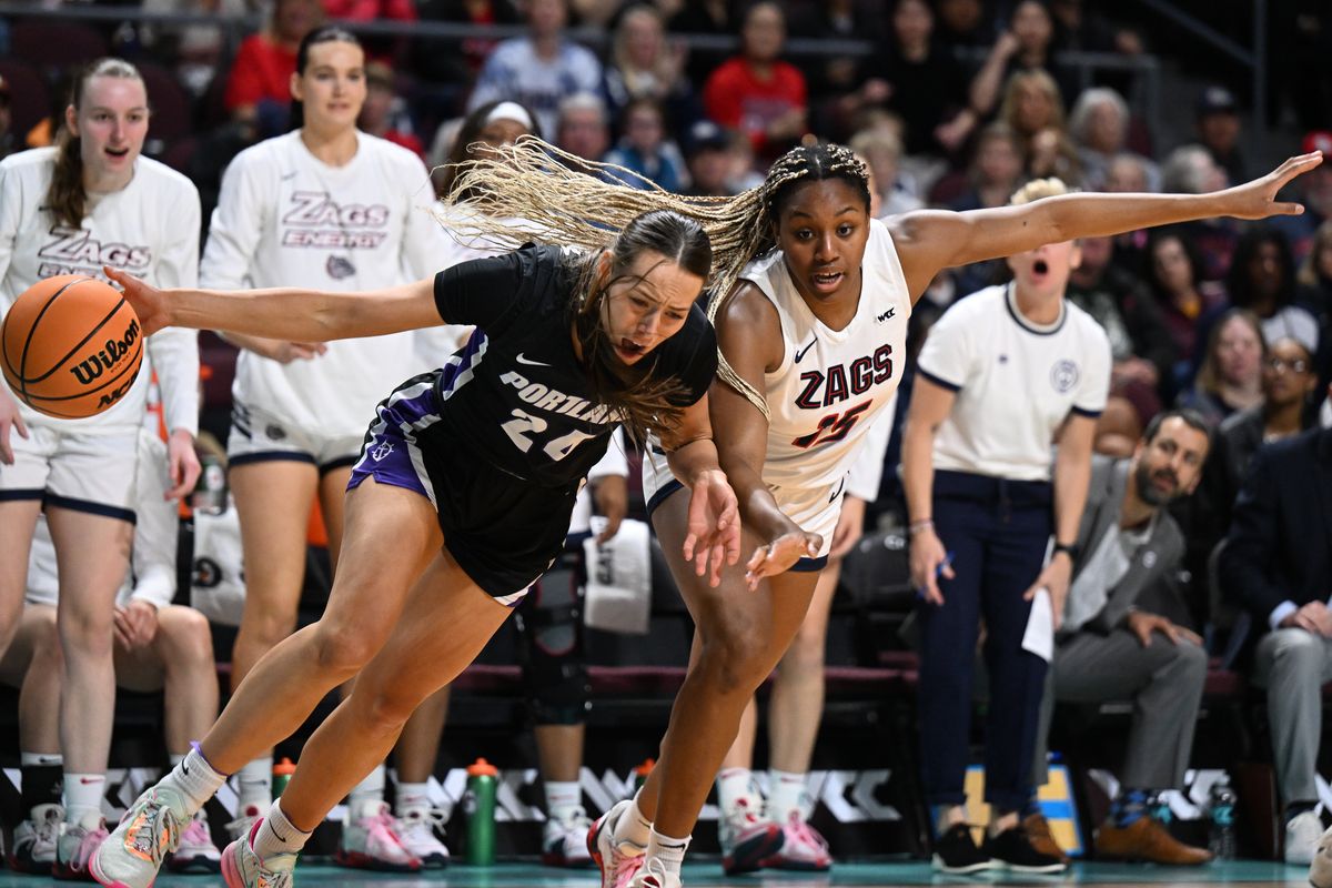 Portland guard Maisie Burnham drives against Gonzaga forward Yvonne Ejim during the first half of the West Coast Conference women’s championship game on March 12 at Orleans Arena in Las Vegas.  (Tyler Tjomsland/The Spokesman-Review)