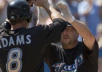 
Toronto Blue Jays' Matt Stairs, right, and Russ Adams celebrate a home run. Associated Press
 (Associated Press / The Spokesman-Review)